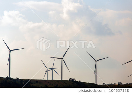 Wind turbines on sunny morning Wind turbines on sunny morning 104637328