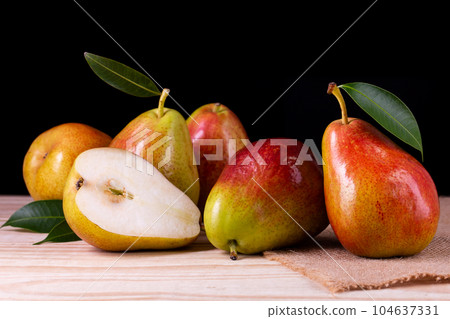 Sweet pears in the basket 104637331