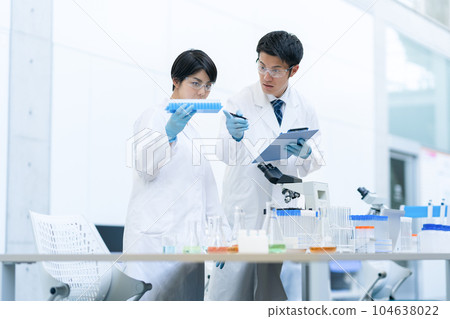 Researchers having a meeting at the laboratory Researchers having a meeting at the laboratory 104638022