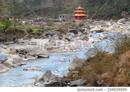Mountain stream scenery along the Annapurna trekking course in the Himalayas, Nepal, South Asia Mountain stream scenery along the Annapurna trekking course in the Himalayas, Nepal, South Asia 104639894