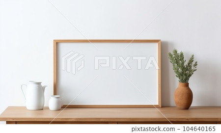 blank wooden canvas frame on white wall with Stock