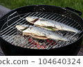 Fresh grilled fish barbeque, whole roasted bass 104640324