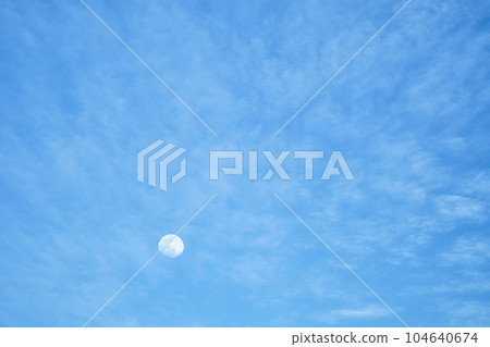 Evening blue sky with full moon clouds, idea for background, sunset on the Aegean coast, ramadan Evening blue sky with full moon clouds, idea for background, sunset on the Aegean coast, ramadan 104640674