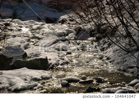 river with snow 104641047