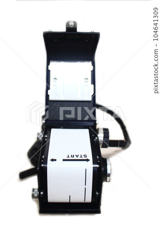 Film mounted on antique twin-lens reflex camera White background Film mounted on antique twin-lens reflex camera White background 104641309