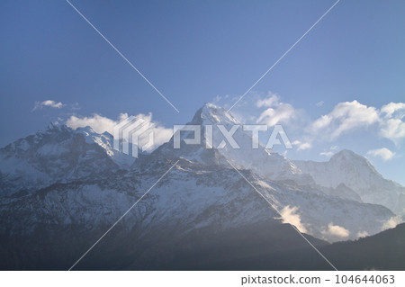 Nepal in South Asia View of the Annapurna Mountains at dawn from Poon Hill Observatory, a famous spot for viewing the Himalayas 104644063