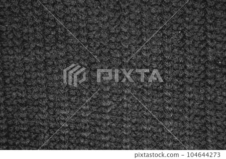 Handmade knitted material with detail wool threads. Handmade knitted material with detail wool threads. 104644273