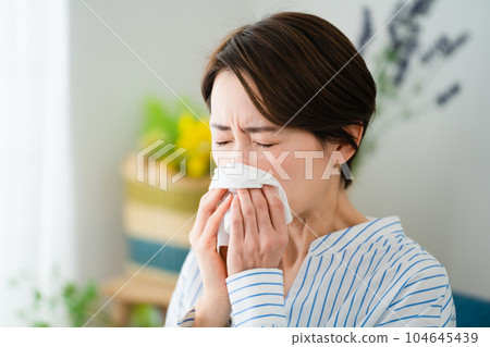 Young woman suffering from rhinitis Hay fever image Young woman suffering from rhinitis Hay fever image 104645439