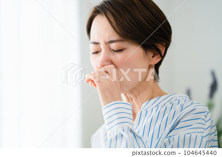 Young woman suffering from rhinitis Hay fever image Young woman suffering from rhinitis Hay fever image 104645440