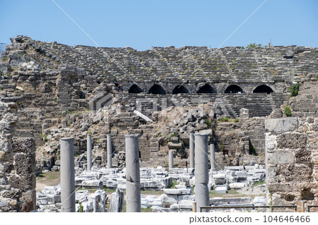 Side Ancient theatre. Turkey. Antalya. Ruins of the ancient city of Side. The largest amphitheater in Turkey. Main street of the ancient city. Mediterranean Sea. 104646466