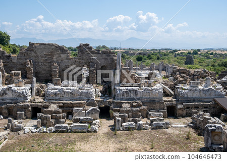 Side Ancient theatre. Turkey. Antalya. Ruins of the ancient city of Side. The largest amphitheater in Turkey. Main street of the ancient city. Mediterranean Sea. Side Ancient theatre. Turkey. Antalya. Ruins of the ancient city of Side. The largest amphitheater in Turkey. Main street of the ancient city. Mediterranean Sea. 104646473