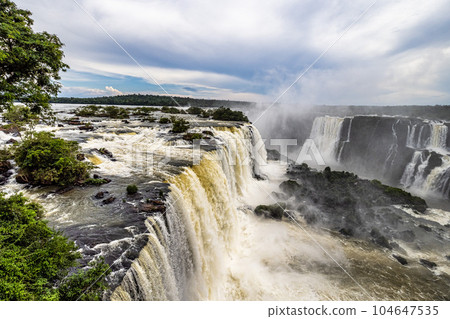 Devil's Throat at Iguazu Falls, one of the world's great natural wonders, on the border of Argentina and Brazil. Devil's Throat at Iguazu Falls, one of the world's great natural wonders, on the border of Argentina and Brazil. 104647535