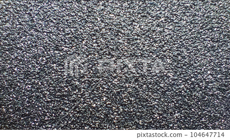 Macro photograph roll of sandpaper texture. Abstract background or texture. Blank for design 104647714