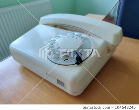 White old phone on office. Concept of obsolete technology 104648246