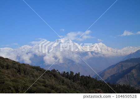 Dhaulagiri mountain range from Ghorepani village along the Annapurna trekking course in the Nepal Himalayas in South Asia Dhaulagiri mountain range from Ghorepani village along the Annapurna trekking course in the Nepal Himalayas in South Asia 104650528