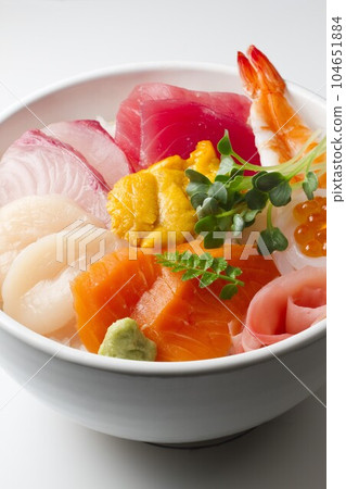 Bowl of rice topped with sashimi Bowl of rice topped with sashimi 104651884