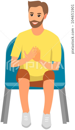 Smiling man in viewer seat looking at something and applauding. Guy sits and claps his hands 104651901