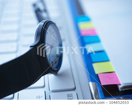 Binders and documents on the table, keyboard Binders and documents on the table, keyboard 104652033