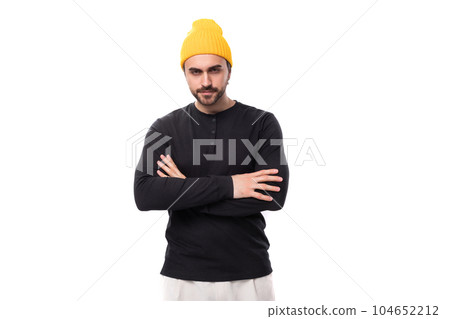 young handsome caucasian brunette man with beard in informal style on white background with copy young handsome caucasian brunette man with beard in informal style on white background with copy 104652212