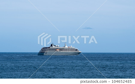 the ship leaves the port of Madeira for the ocean 104652485