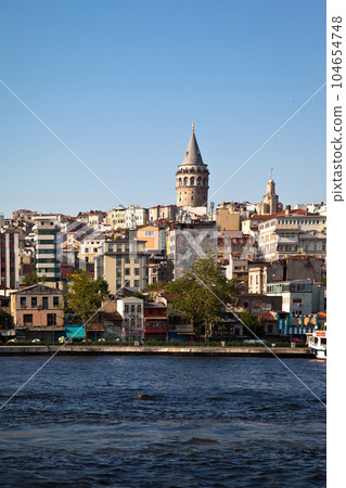 Galata Bridge and Galata Tower, one of the most visited places in Istanbul, june 26 2019 Eminonu Istanbul Turkey Galata Bridge and Galata Tower, one of the most visited places in Istanbul, june 26 2019 Eminonu Istanbul Turkey 104654748
