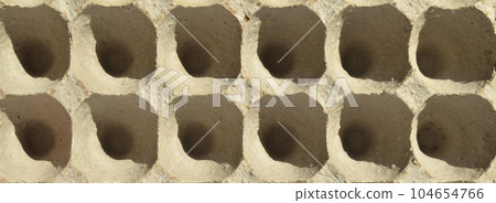 White and grey empty egg carton, recyclable egg container made of pulp White and grey empty egg carton, recyclable egg container made of pulp 104654766