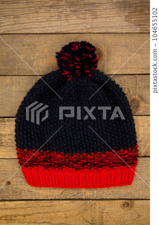 Handmade red and navy blue wool knitted winter hat 104655102