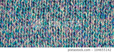Handmade knitted fabric colored wool background texture Handmade knitted fabric colored wool background texture 104655142