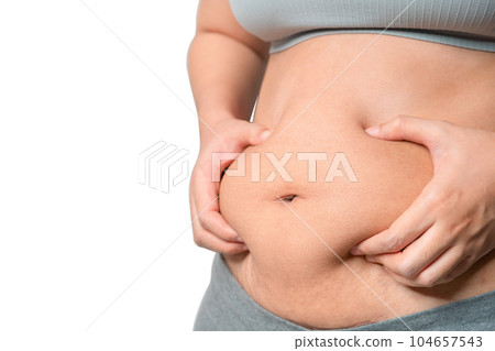 Chubby woman hand holding belly fat, Woman diet lifestyle concept,  Isolate on white background. 104657543