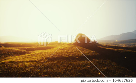 High mountain summer landscape and meadow with huge stones among the grass High mountain summer landscape and meadow with huge stones among the grass 104657626