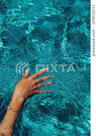 Swimming in a pool. Summer holidays concept. Swimming in a pool. Summer holidays concept. 104658311