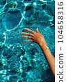 Swimming in a pool. Summer holidays concept. 104658316