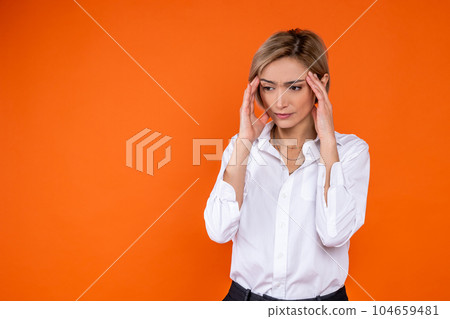 Sick tired woman wearing white official style shirt massaging temples Sick tired woman wearing white official style shirt massaging temples 104659481
