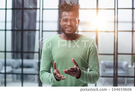 Portrait of an African American man in casual clothes 104659606