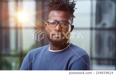 businessman with glasses dressed in blue casual clothes businessman with glasses dressed in blue casual clothes 104659624