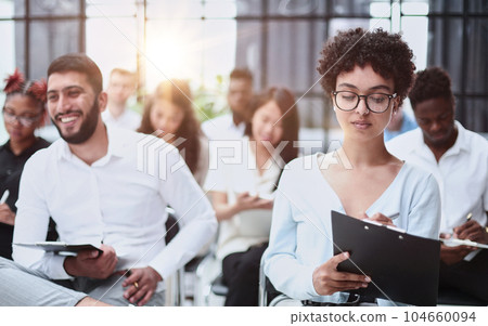 people sitting in business seminar room in hotel business people sitting in business seminar room in hotel business 104660094
