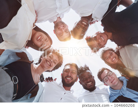 Happy diverse professional business team stand in office looking at camera 104660208