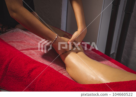 Osteopathy Treatment on Patient's Leg Osteopathy Treatment on Patient's Leg 104660522