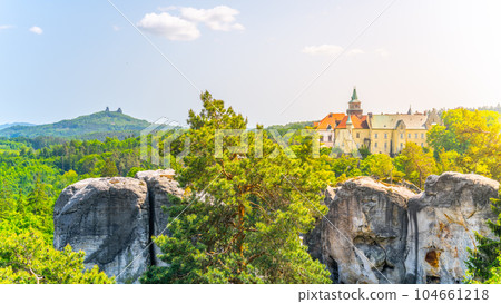 Bohemian Paradise, Czech: Cesky Raj, panorama. View of Hruba Skala Castle, Trosky Castle Ruins and sandstone rocks from Marianska Lookout on sunny summer day, Czech Republic Bohemian Paradise, Czech: Cesky Raj, panorama. View of Hruba Skala Castle, Trosky Castle Ruins and sandstone rocks from Marianska Lookout on sunny summer day, Czech Republic 104661218