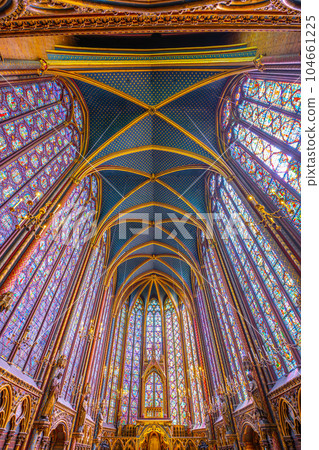 Monumental interior of Sainte-Chapelle with stained glass windows, upper level of royal chapel in the Gothic style. Palais de la Cite, Paris, France 104661225