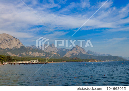 View of the Mediterranean sea coast and the Taurus mountains in Kemer, Antalya province in Turkey View of the Mediterranean sea coast and the Taurus mountains in Kemer, Antalya province in Turkey 104662035