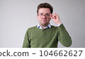 The angry European young man wearily looks. He is without strength and energy 104662627