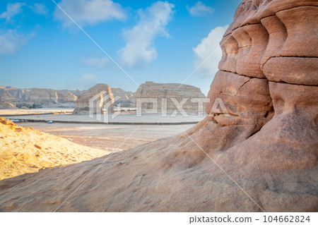 Desert erosion formations with elephant rock in the background,  near Al Ula, Saudi Arabia 104662824