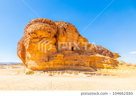 Jabal al Ahmar ancient  Nabataean civilization tombs carved in stone, Hegra, Madinah Saleh, Al Ula, Saudi Arabia 104662880