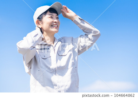 Middle female manager wearing work clothes 104664862