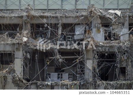 A demolition site with a jumble of scrap metal A demolition site with a jumble of scrap metal 104665351