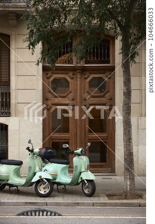 An old house in a romantic city. Colorful and beautiful gates made of wood. vintage door. 104666033