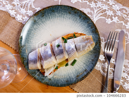 Appetizing sandwich with lightly salted herring Appetizing sandwich with lightly salted herring 104666283
