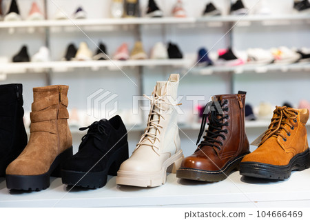 Lots of leather wintry male and female shoes at store 104666469