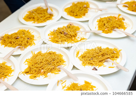 Portions of traditional dish Valencian cuisine Fideua de Marisco Portions of traditional dish Valencian cuisine Fideua de Marisco 104666585